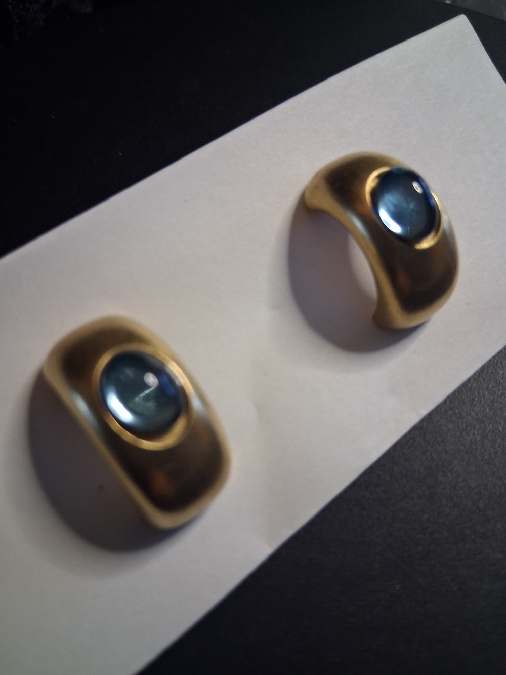 Gold Tone Half Moon Earrings with Blue Cabochons.